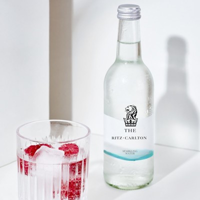 Picture of PREMIUM 750ML SPARKLING NATURAL SPRING BRANDED GLASS WATER BOTTLE.